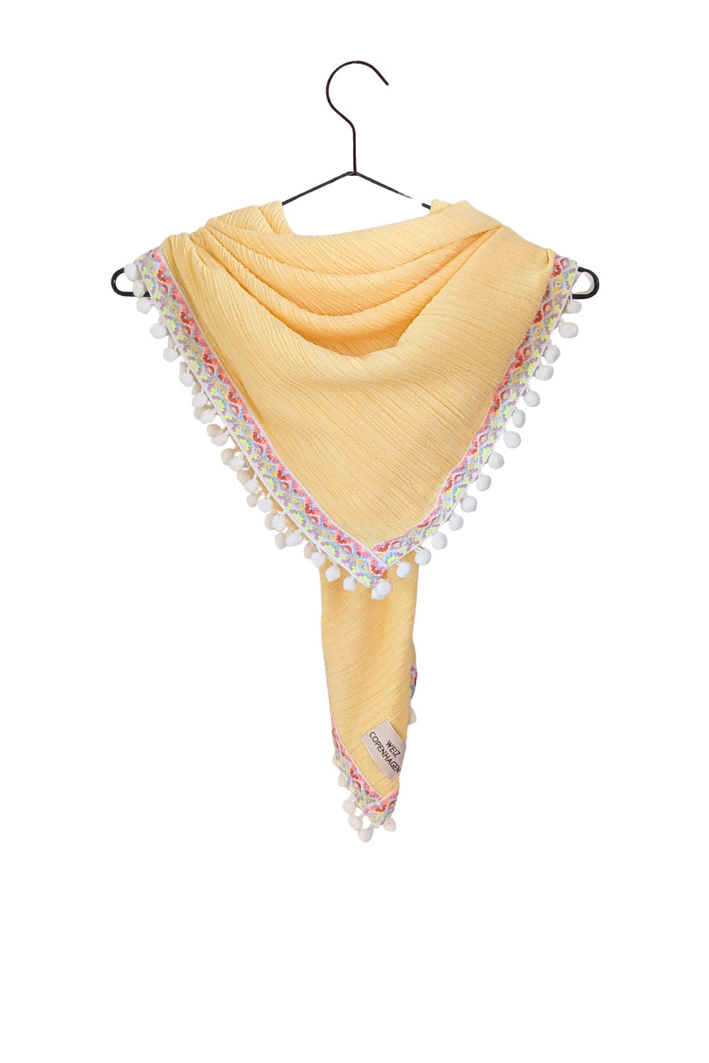 Yellow pom pom scarf